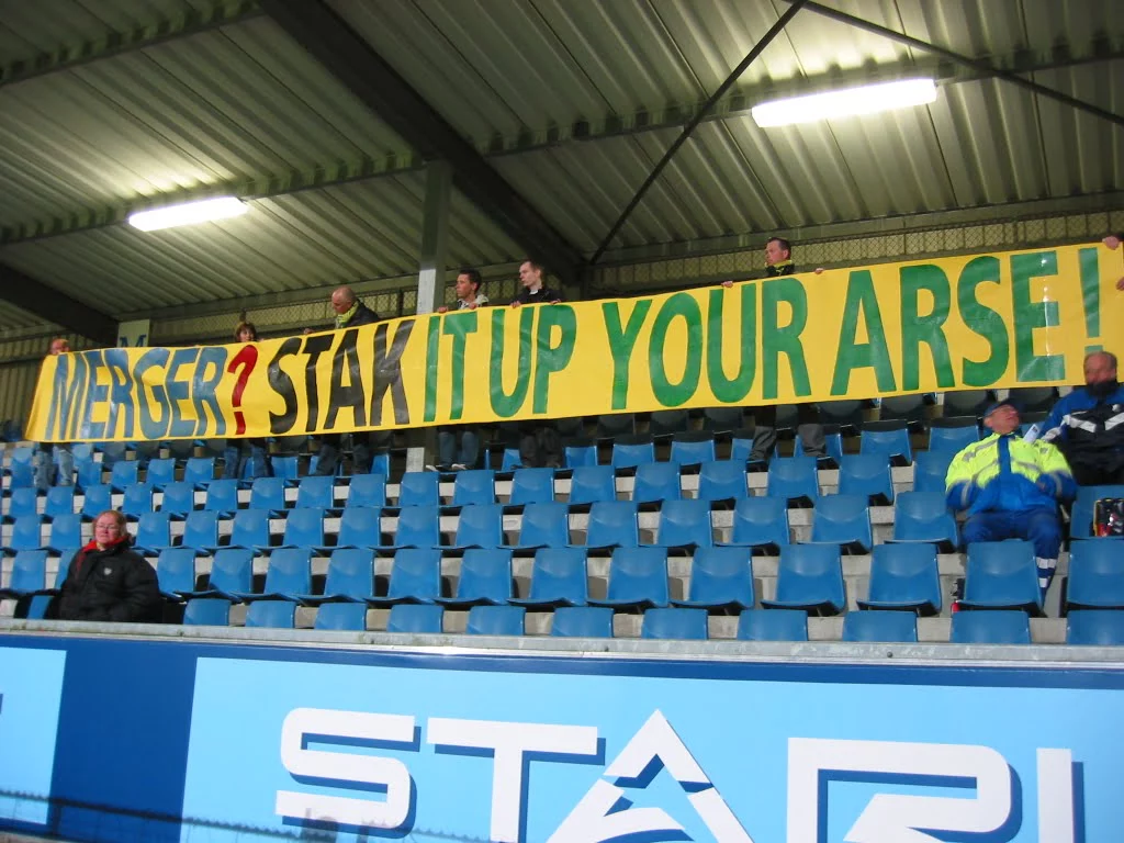 merger-stak-it-up-your-arse